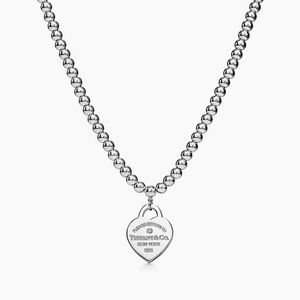 Tiffany &Co. Heart Tag bead silver necklace